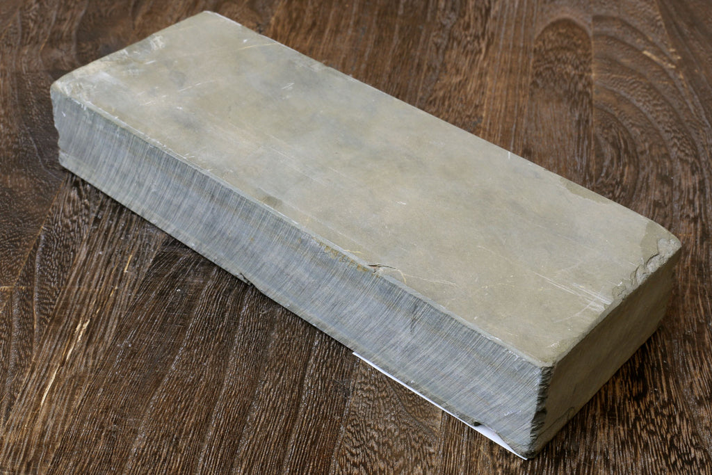 Natural whetstone sharpening stone, rectangular block in light gray with beveled edge