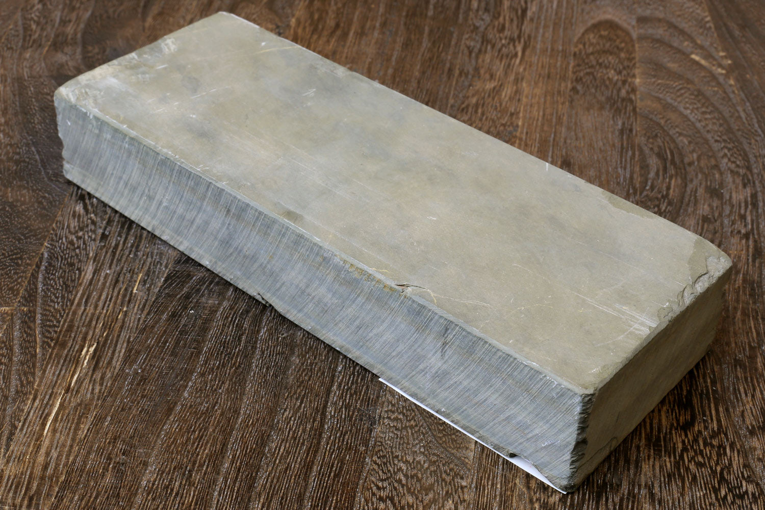Natural whetstone sharpening stone, rectangular block in light gray with beveled edge