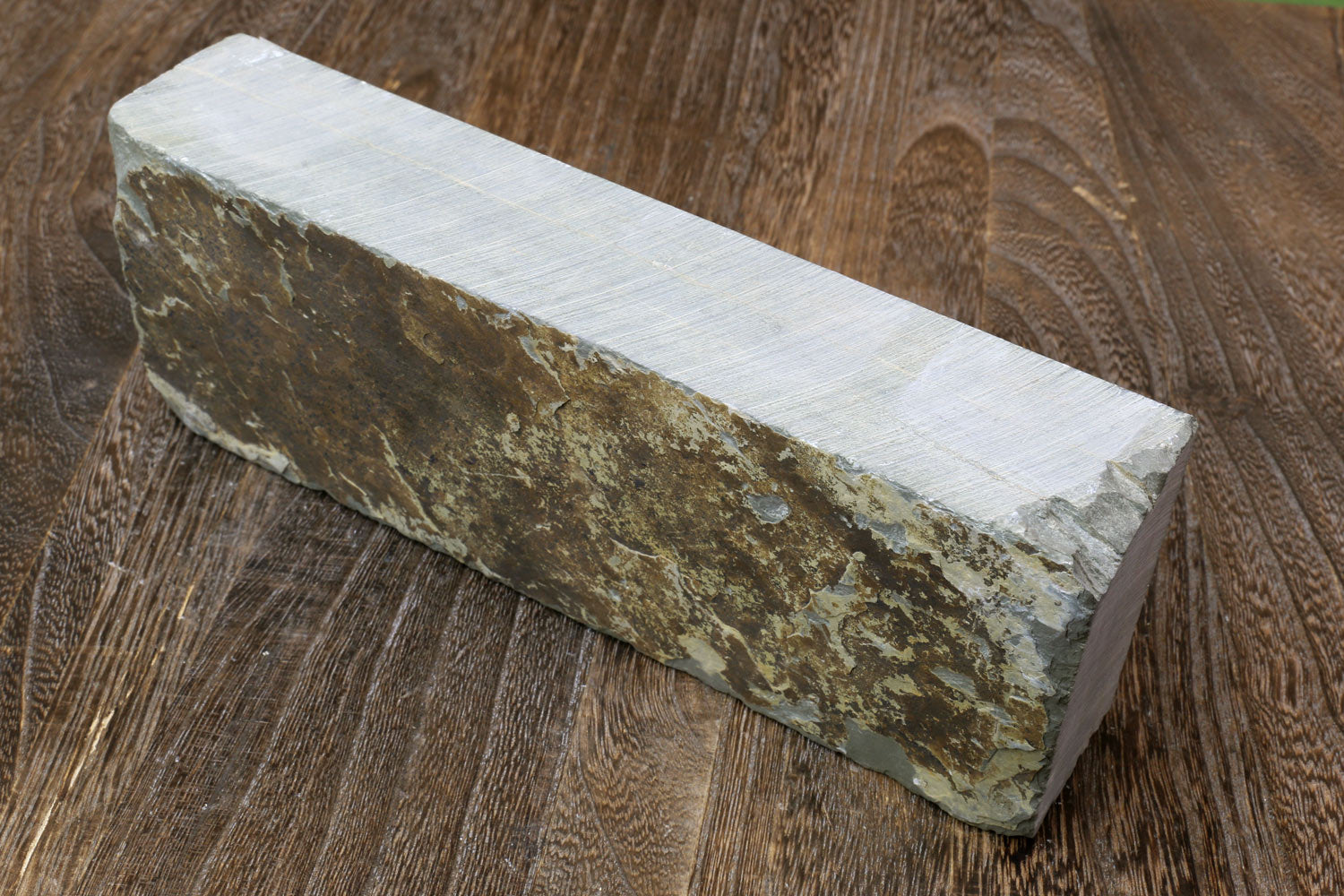 Natural sharpening whetstone rectangular block, speckled brown-gray face and pale side