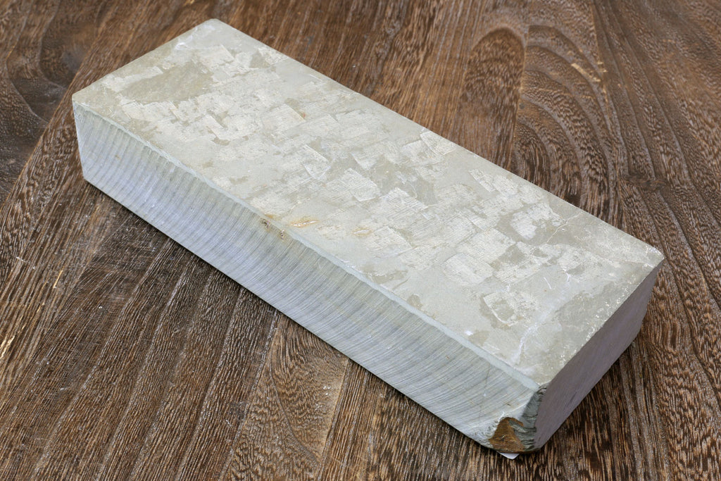Natural finishing whetstone block, pale stone with squared edges and bevelled corner