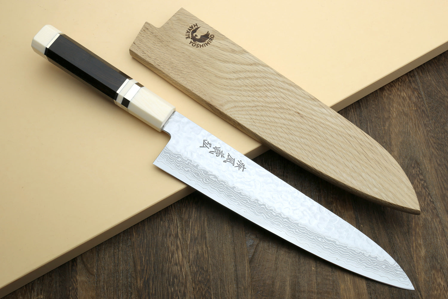 Japanese chef’s gyuto knife with Damascus blade and two-tone handle