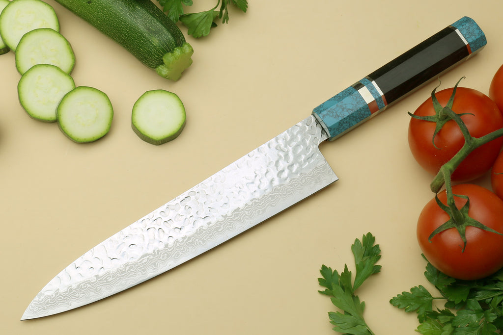 Chef's gyuto knife with white hammered Damascus blade and turquoise octagonal handle