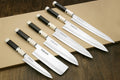 6-piece Damascus steel knife set with hammered blades and octagonal ivory handles