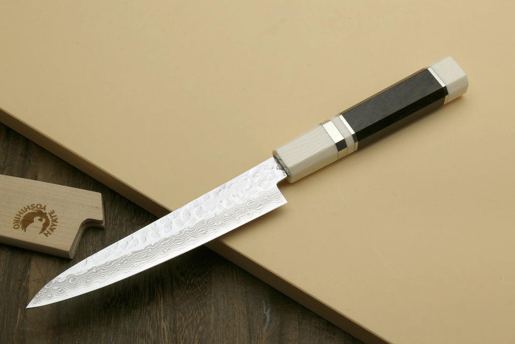 Damascus petty utility knife with ivory handle and hammered steel blade