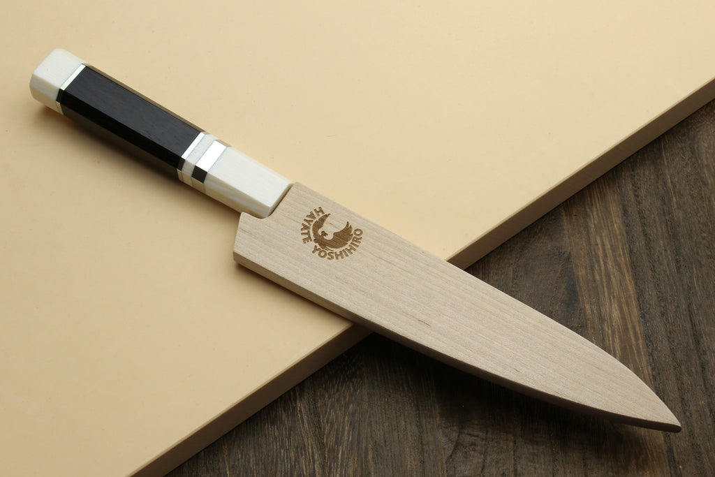 Damascus petty utility knife with ivory handle and black bolster stripe