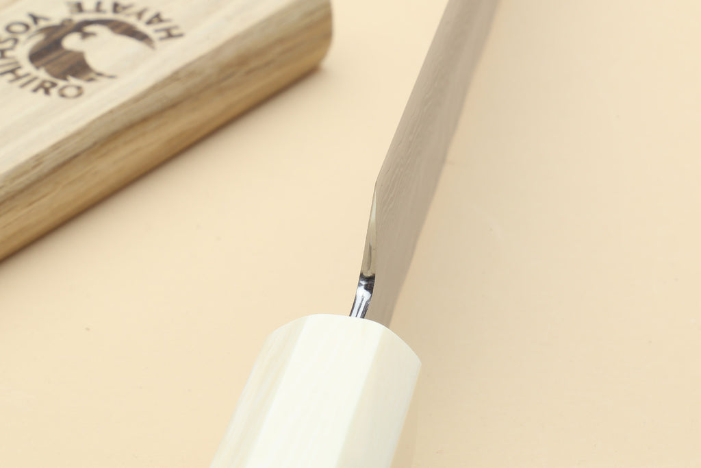 Yoshihiro VG-10 petty knife handle close-up, ivory bolster with rosewood wood grain