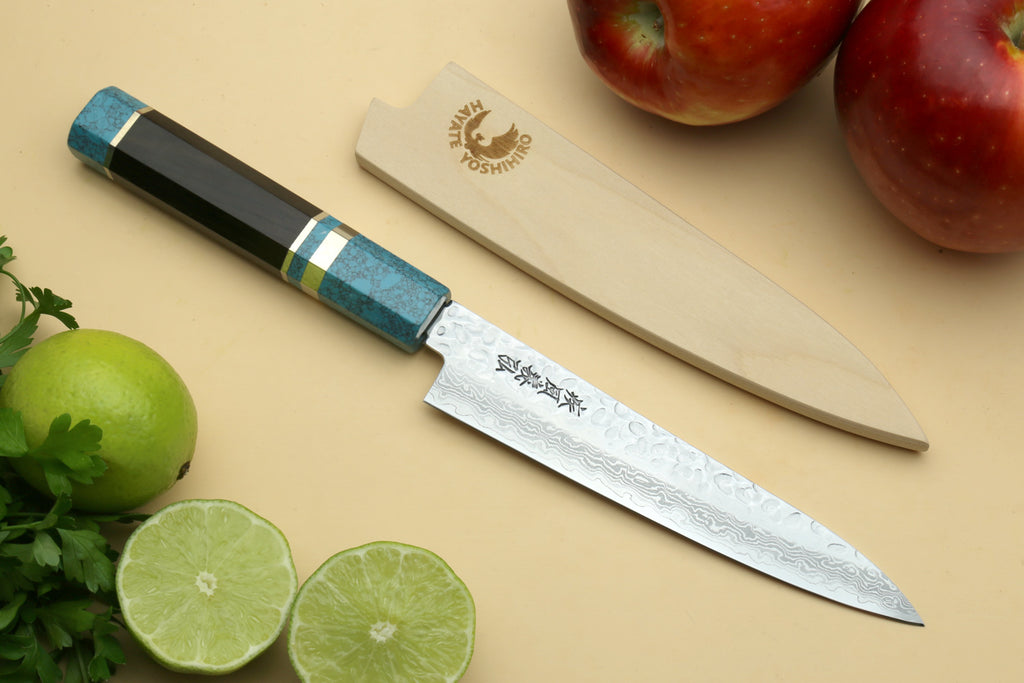 Petty utility chef knife with Damascus steel blade and turquoise blue handle.