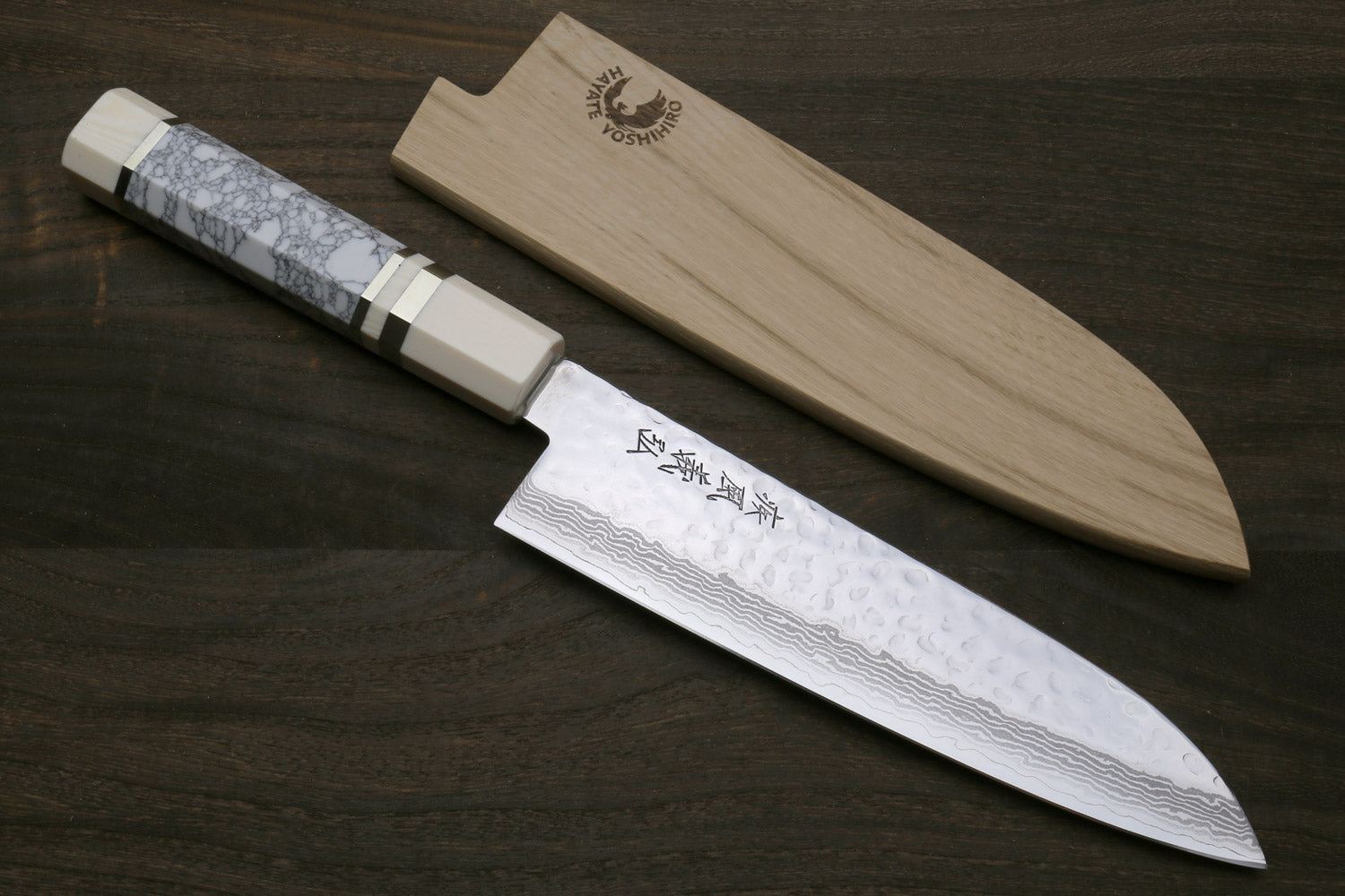 Damascus santoku knife with white howlite handle and ivory-toned bolster, 7 in blade