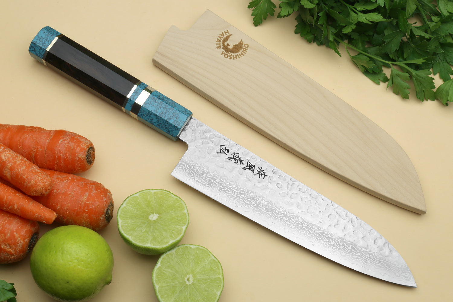 Santoku knife with hammered Damascus blade and turquoise blue octagonal handle