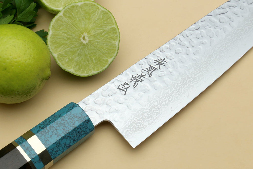Santoku knife with hammered Damascus blade and turquoise blue octagonal handle