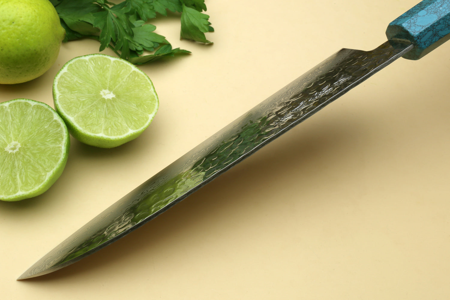 Santoku knife with Damascus blade and turquoise blue octagonal handle