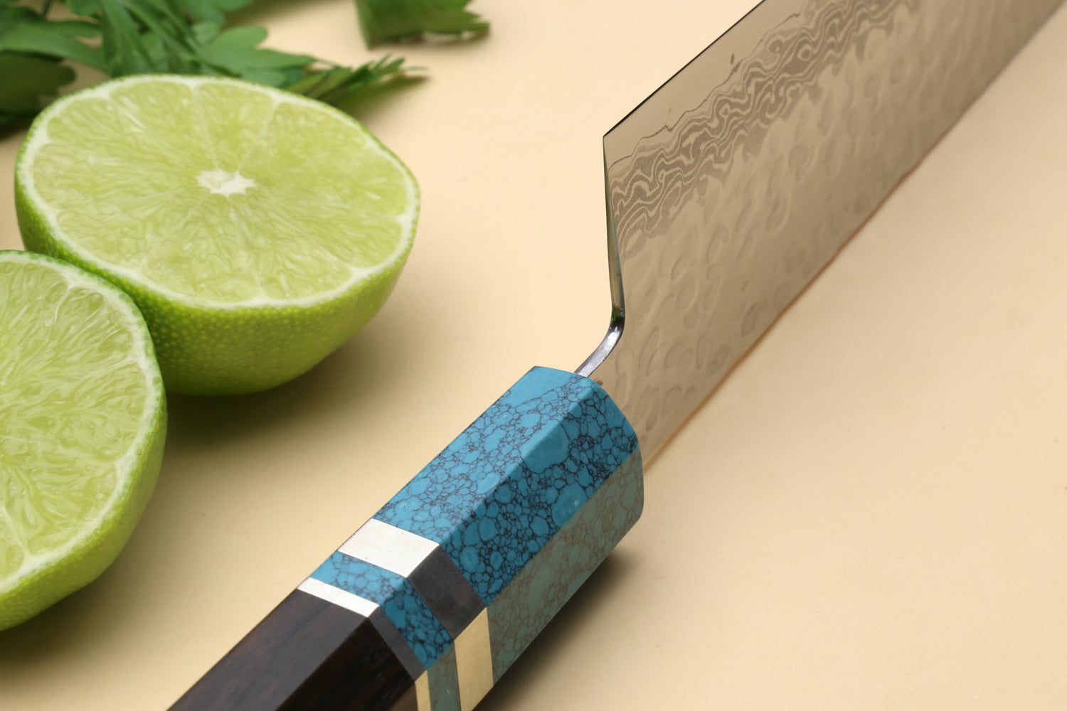 Santoku knife with turquoise blue handle and hammered Damascus blade