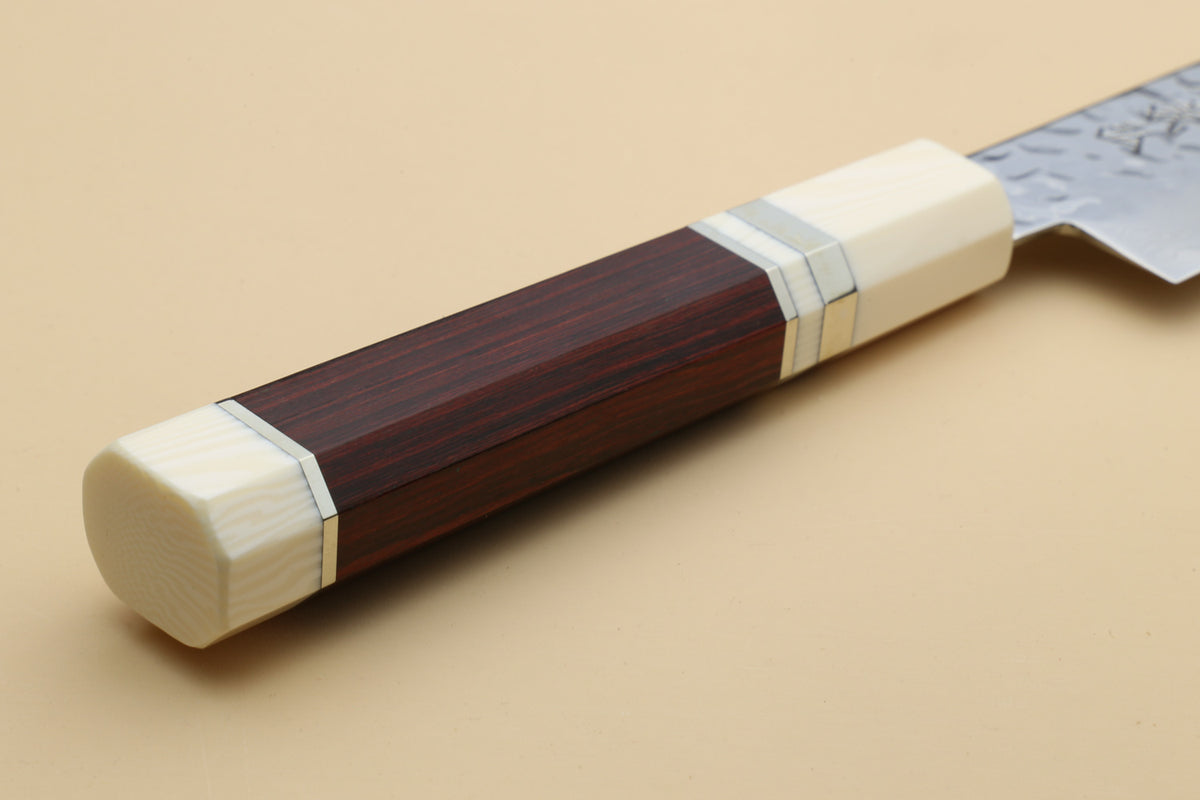 Octagonal rosewood handle with ivory bolster and partial hammered blade