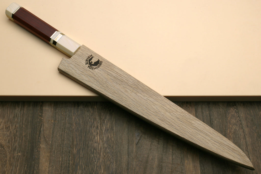 Sujihiki slicer knife with hammered Damascus blade and rosewood octagonal handle