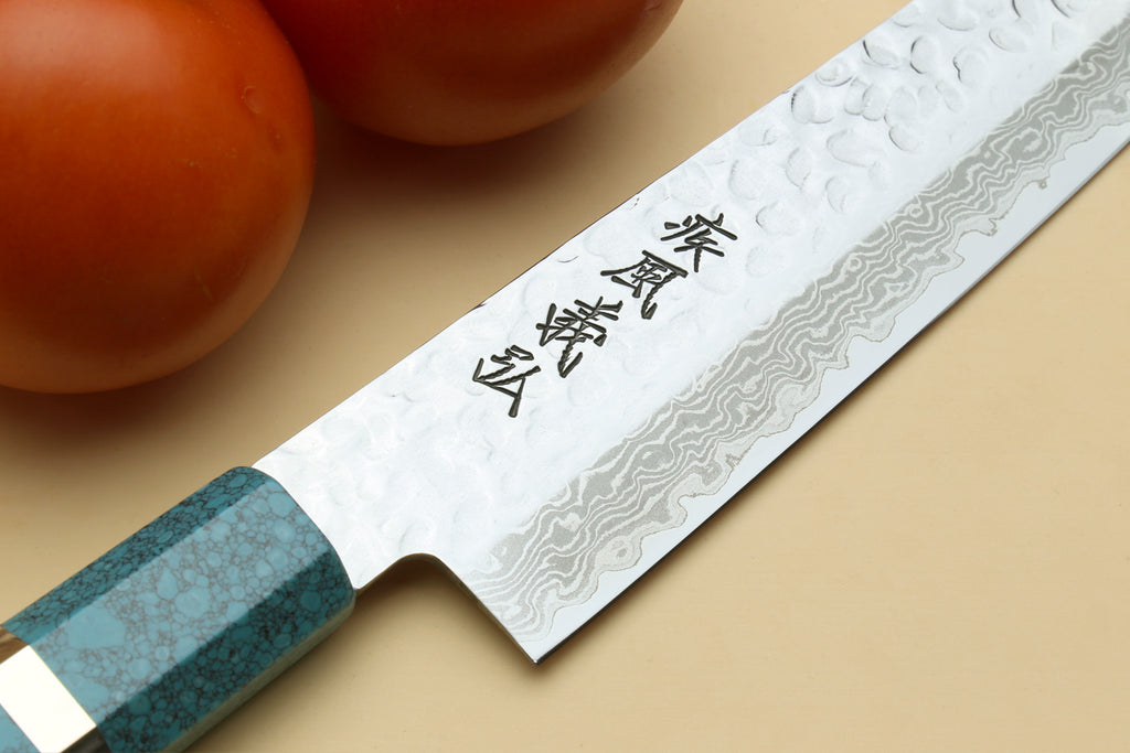 Damascus sujihiki blade with Japanese etching and turquoise octagonal handle