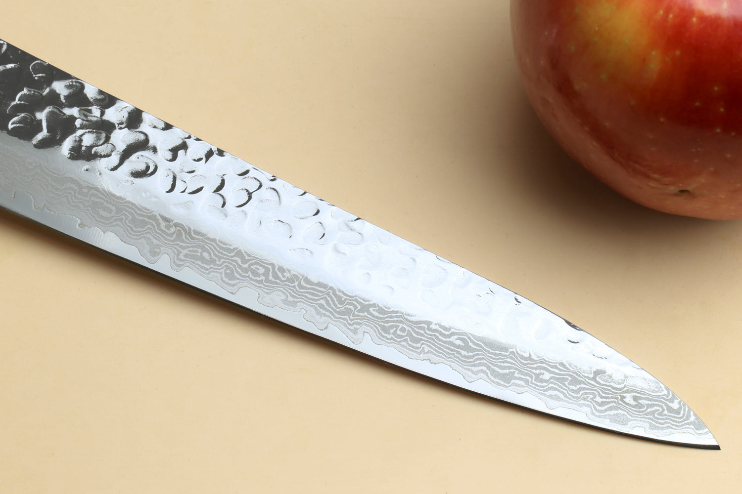 Damascus sujihiki knife with hammered silver blade and pointed tip