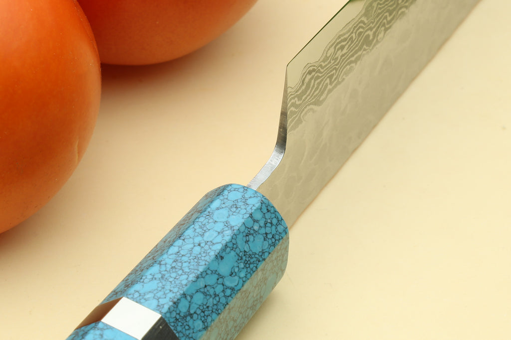 Damascus sujihiki knife with turquoise patterned handle and etched silver blade