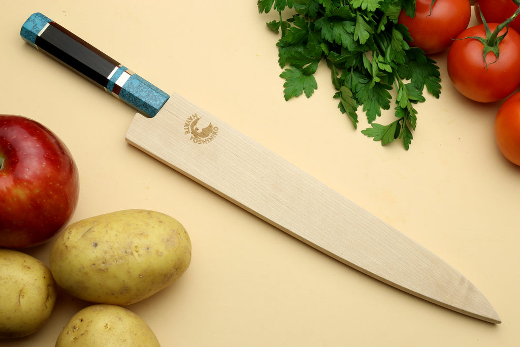 Damascus sujihiki knife with turquoise octagonal handle and long angled silver blade