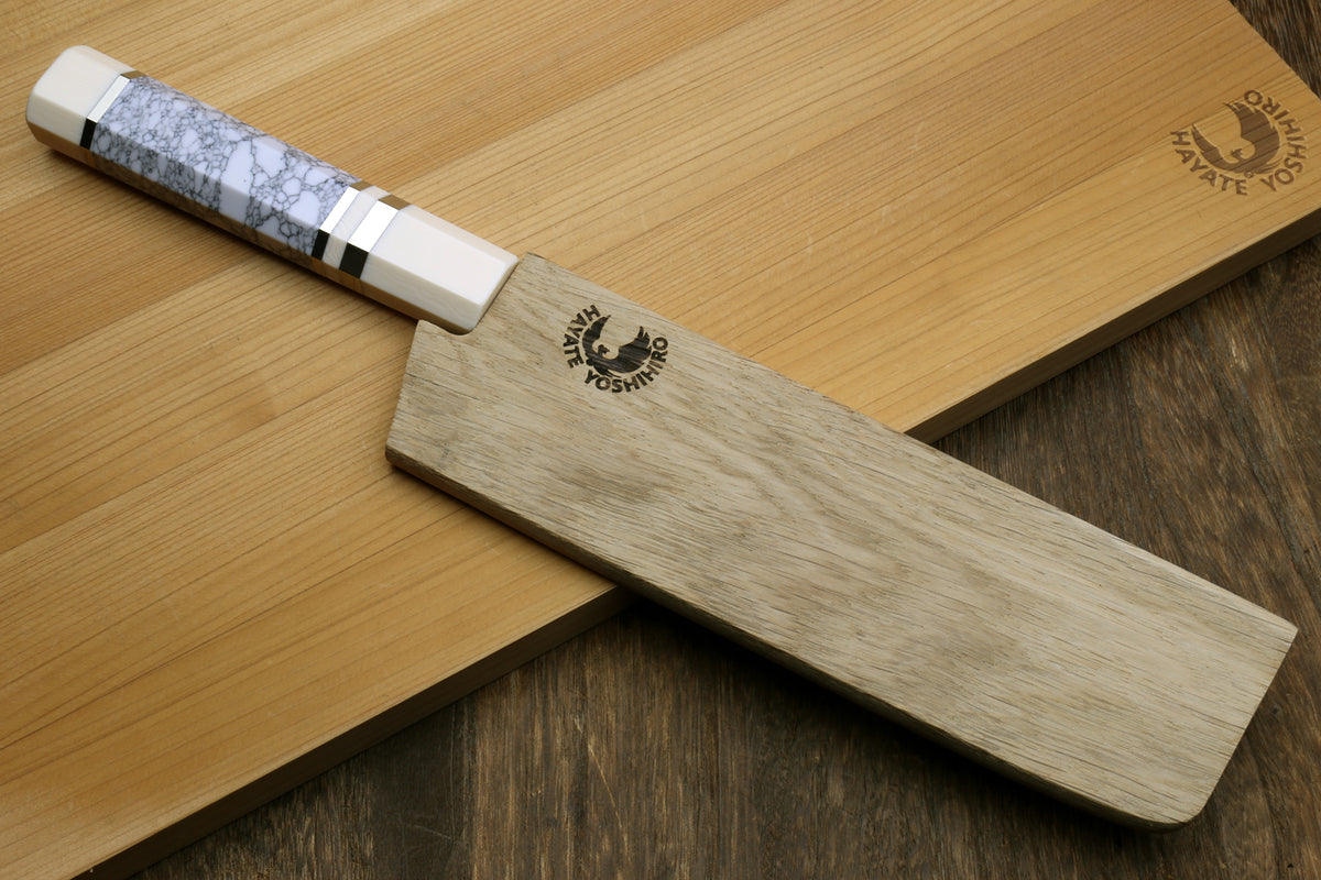 Nakiri vegetable knife, white howlite handle with dark accents, hammered Damascus blade