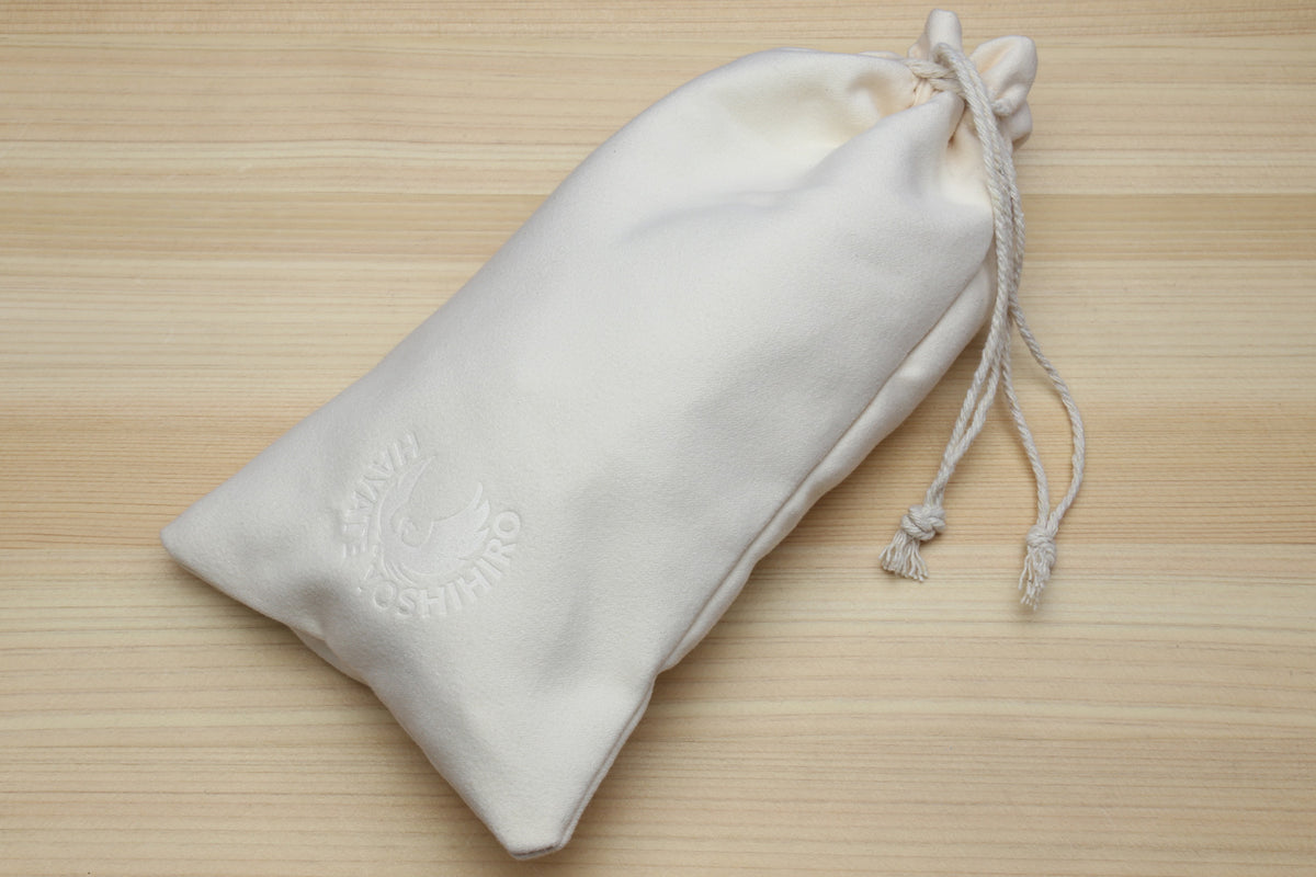 White drawstring storage bag for knife oil care kit items