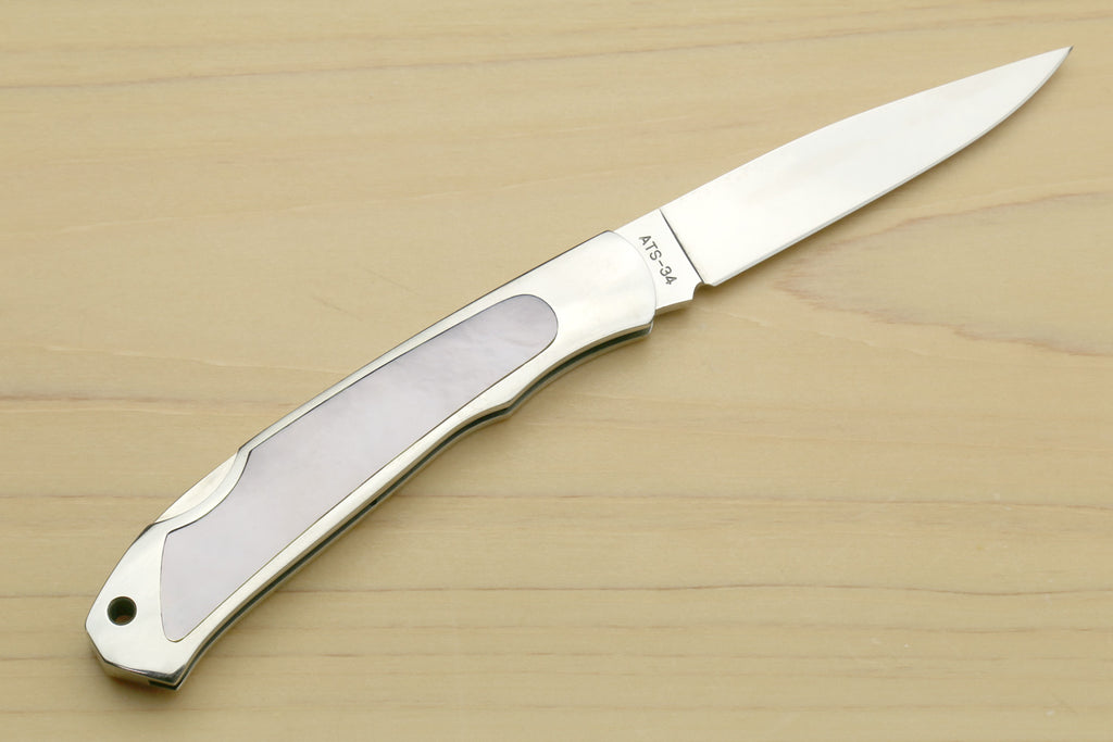 Polished stainless steel lockback folding pocket knife with smooth silver handle