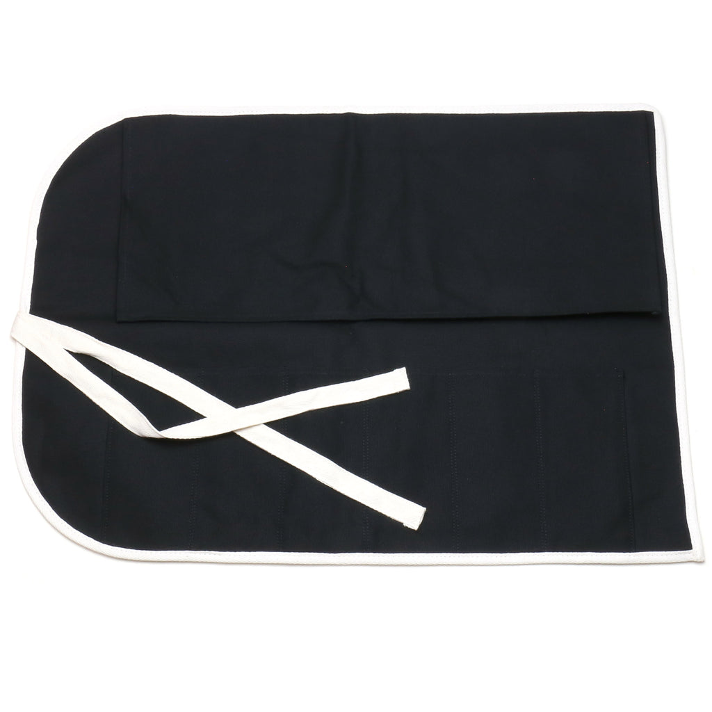 Black cotton knife pouch bag with white tie closure and folded front flap