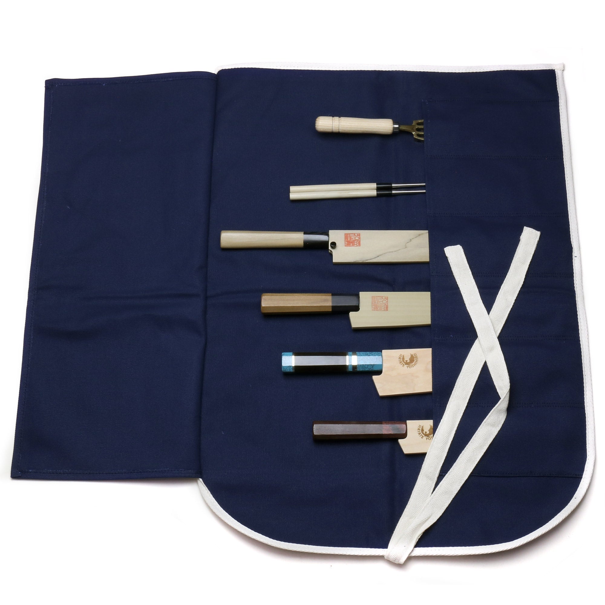 Dark navy cotton knife pouch bag, open with six slots and white tie closure