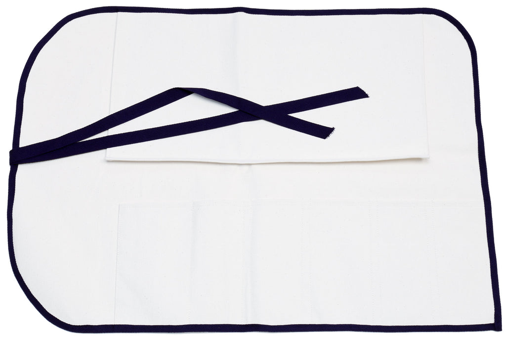 White knife pouch bag with navy border and crossed ribbon ties