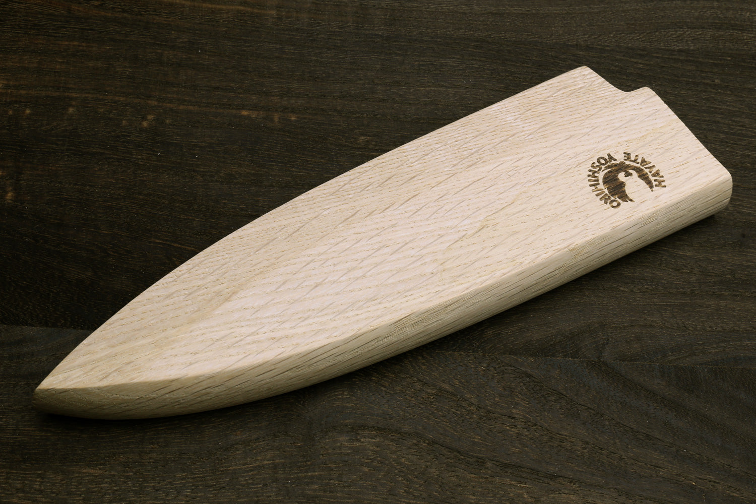 Light oak deba saya knife cover, curved profile with embossed logo