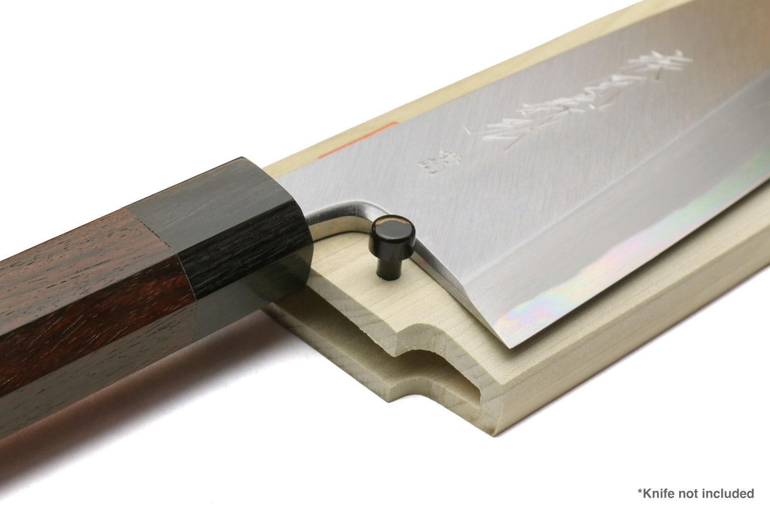 Natural wooden saya knife cover with open slot and black pin; dark knife handle inserted