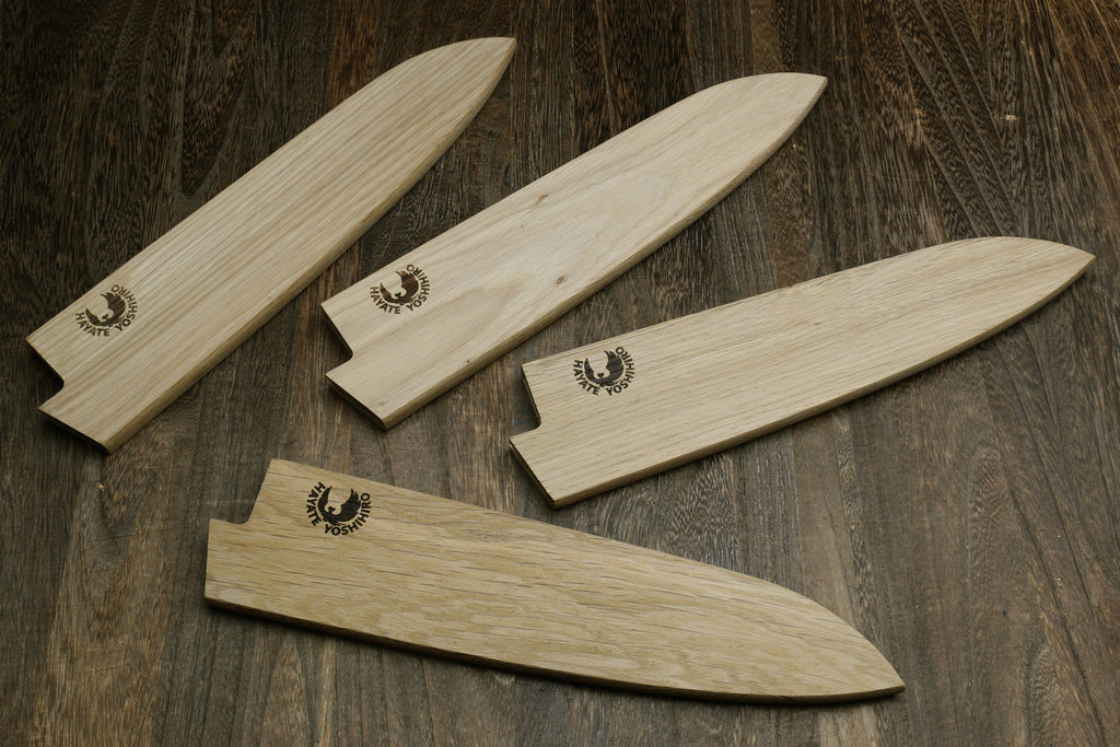 Set of light oak wood saya blade protectors with engraved logos
