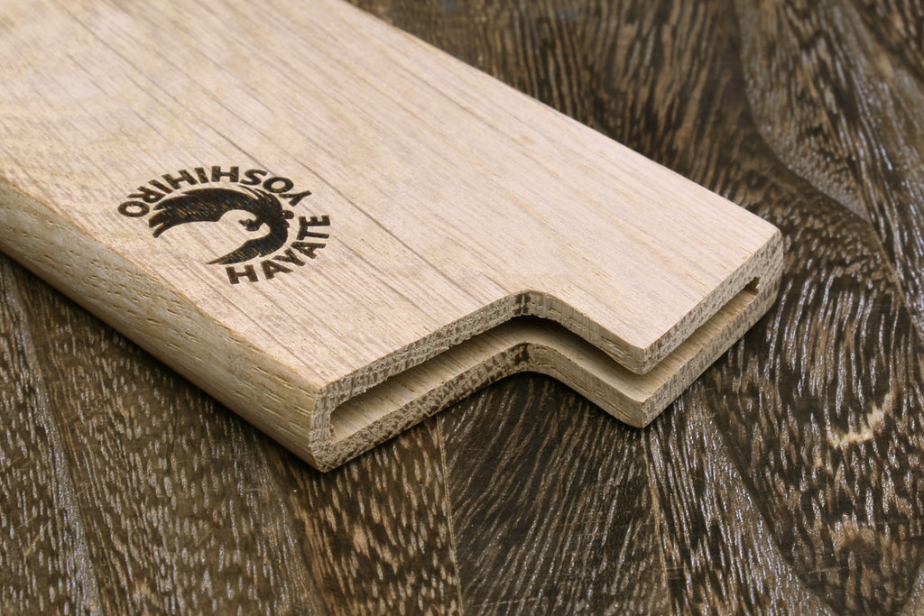 Light oak saya cover end with carved channel and logo, showing interior fit