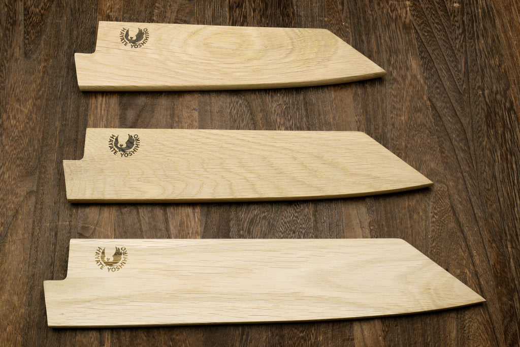 Light oak saya cover with logo, set of three pieces laid flat