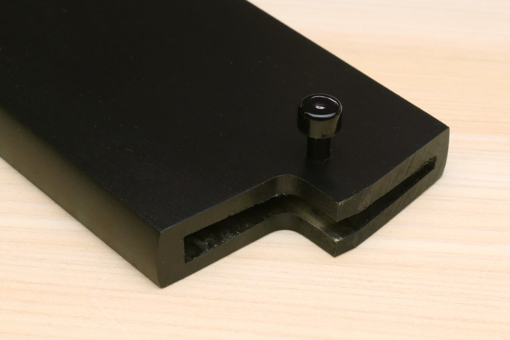 Dark lacquered wooden saya cover with corner notch and round fastening knob