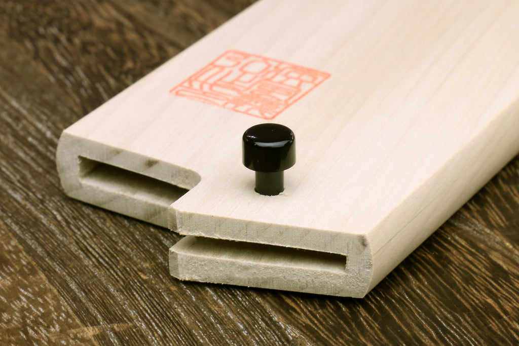Light wood wooden blade protector saya with recessed slots and black knob
