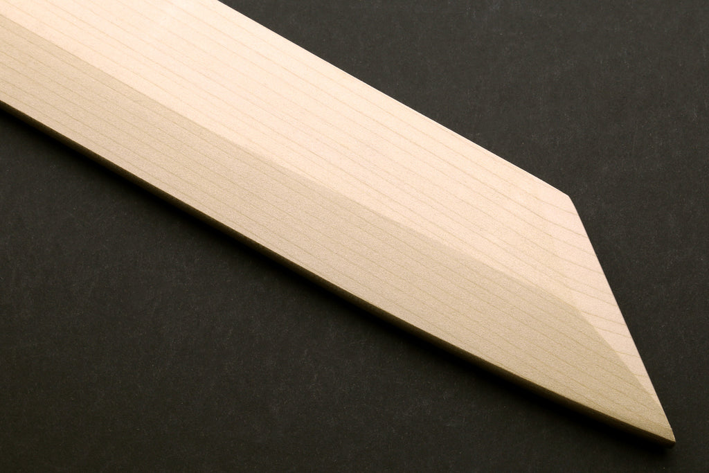 Pale wooden saya cover with pointed end and smooth grain