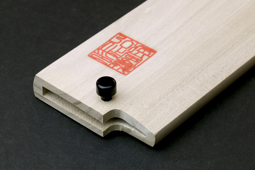 Natural wooden saya cover with cutout handle slot and black knob