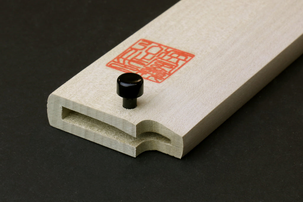 Natural magnolia wooden saya cover tip with black knob and red stamp