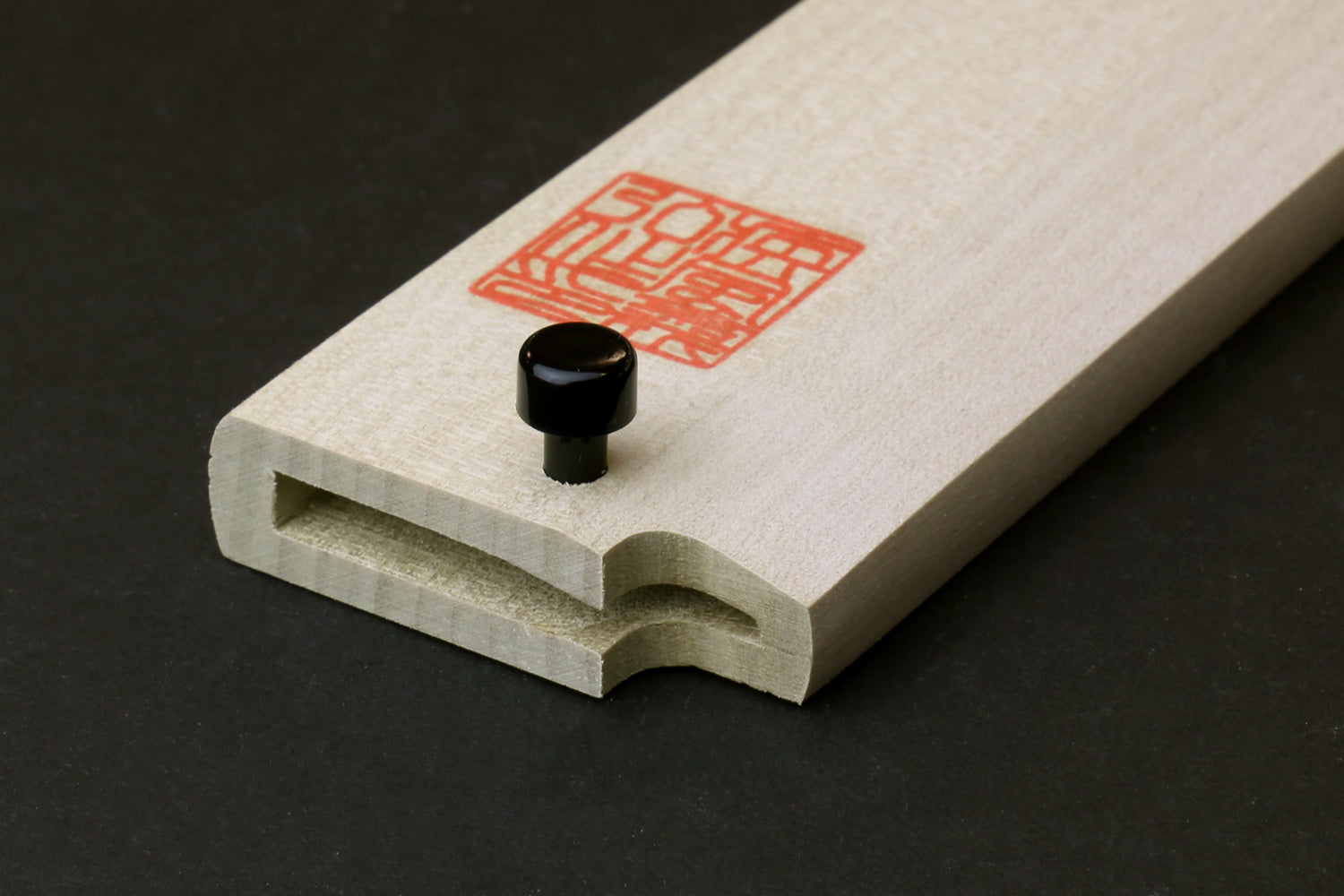 Natural magnolia wooden saya cover tip with black knob and red stamp