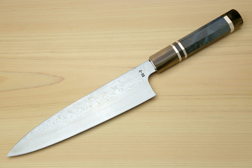 Chef knife with Damascus patterned steel blade and ocean blue handle