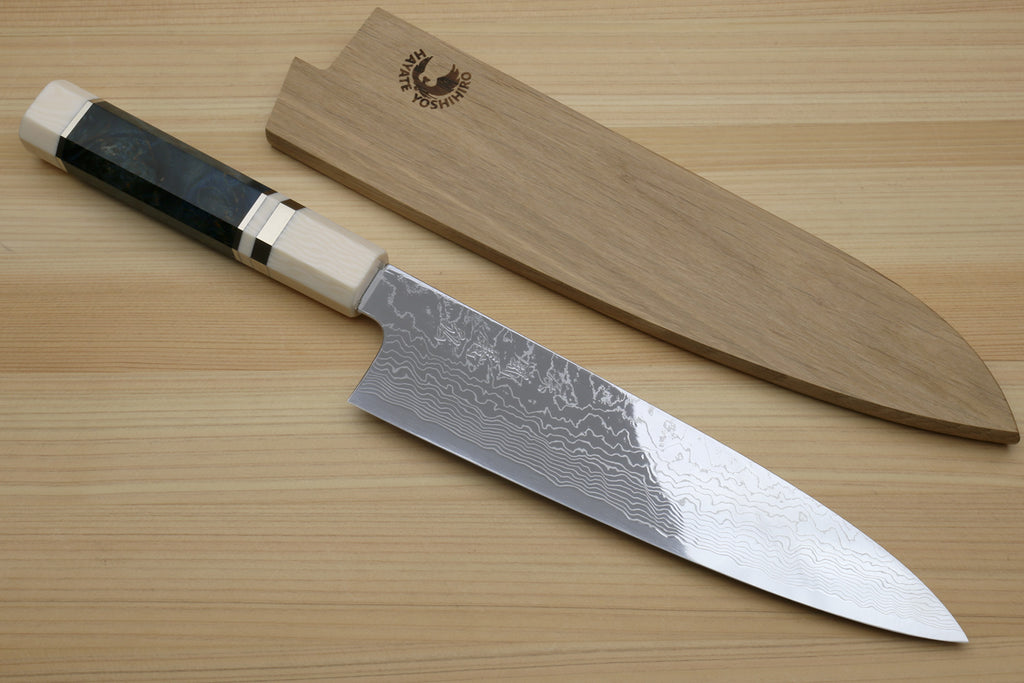 Damascus gyuto chef knife with ocean blue handle, ivory bolster, and patterned steel blade
