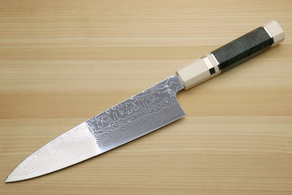 Damascus gyuto chef knife with ocean blue handle and white-patterned steel blade