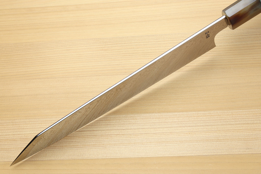 Utility-Kiritsuke chef knife side view with tapered tip and damascus blade