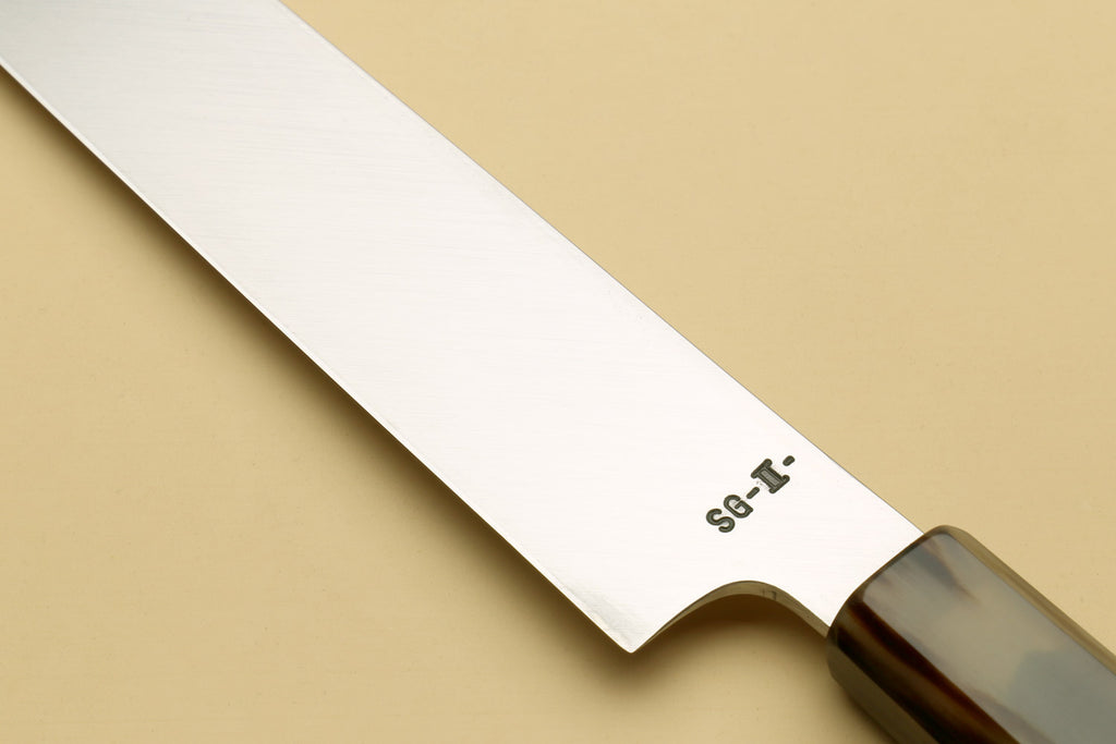 Yanagi sashimi knife close-up of SG-2 mark on mirror-polished blade and handle