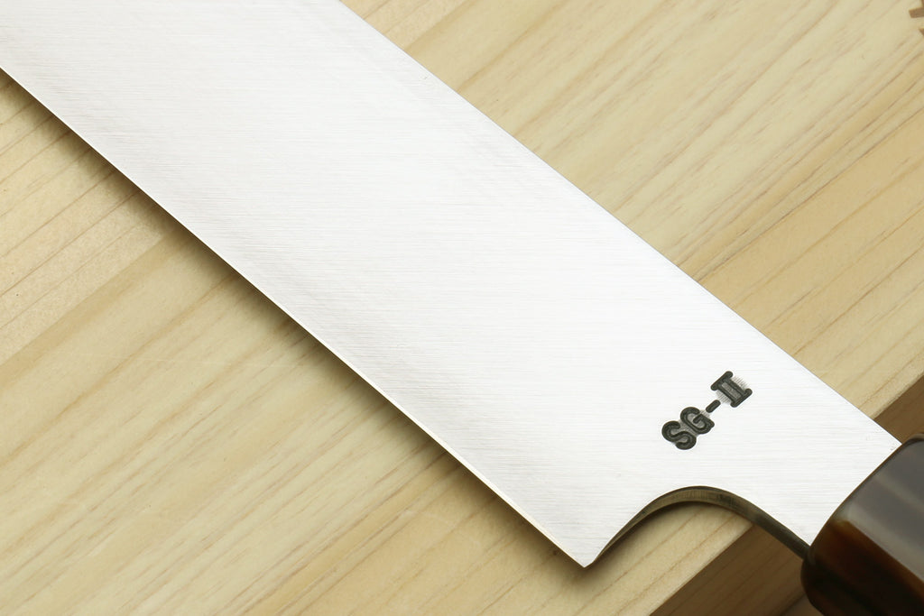 Yanagi kiritsuke knife blade edge with dark ebony handle
