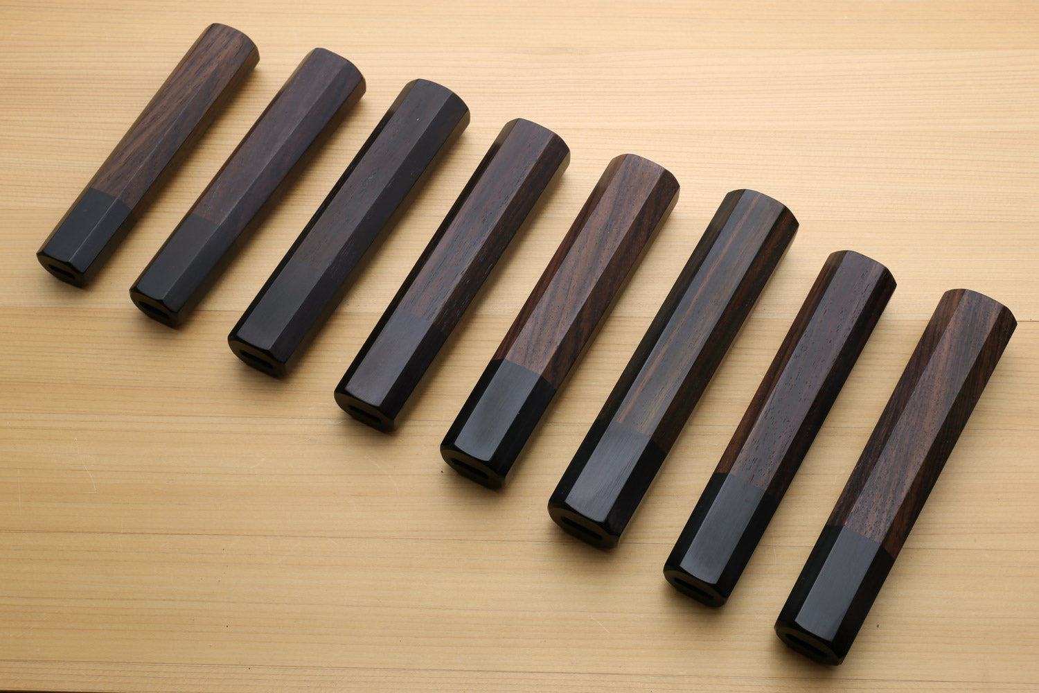 Chef knife handle set: rosewood scales with ebony bolster, angled view
