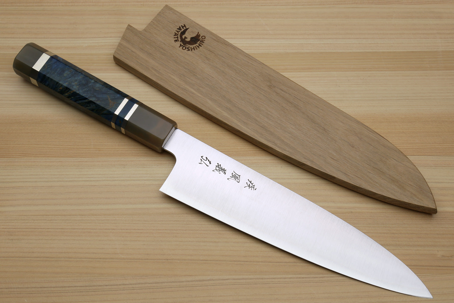 Gyuto chef knife with ocean blue-pattern handle and wooden sheath