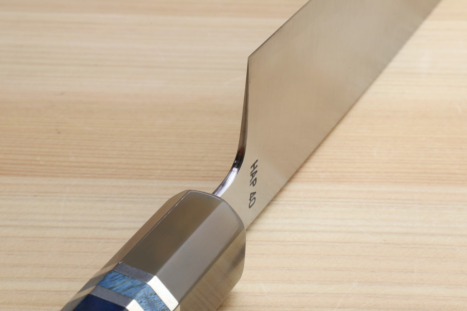 Gyuto chef knife with ocean blue-pattern handle and stainless steel bolster