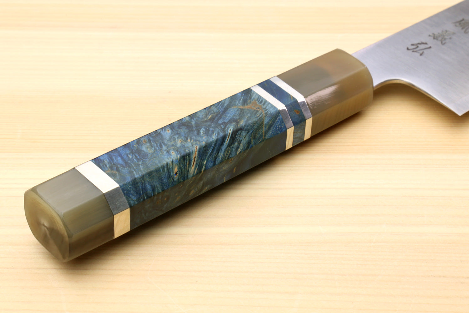 Gyuto chef knife handle end with ocean blue-pattern inlay