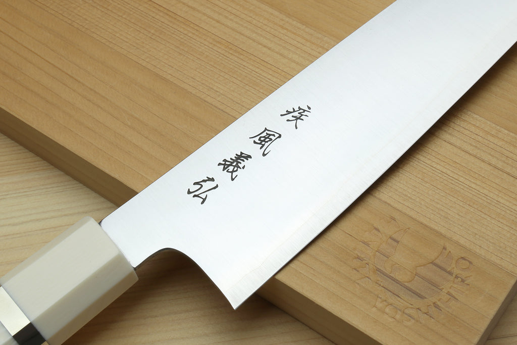 Gyuto chef knife stainless steel blade with Japanese characters, ivory and blue handle